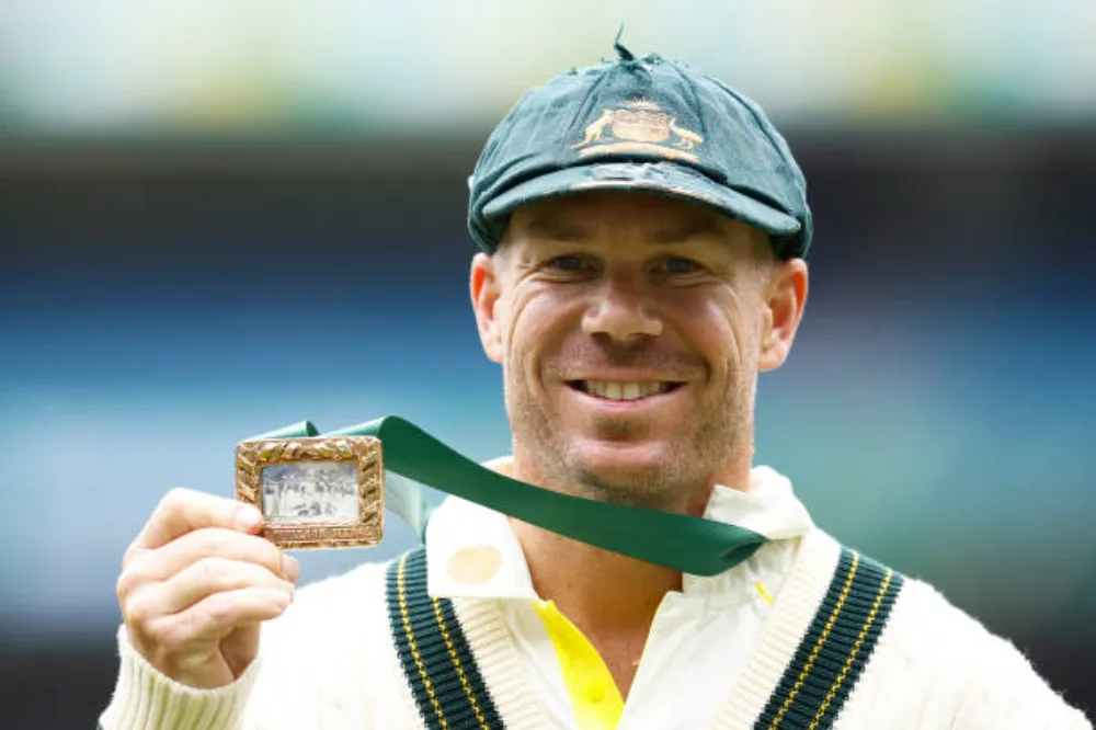 david warner posing getty