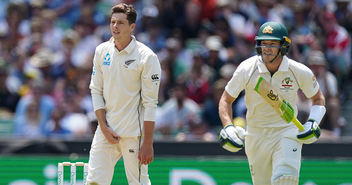 Mitchell Santner shown the door with a spinning top on table