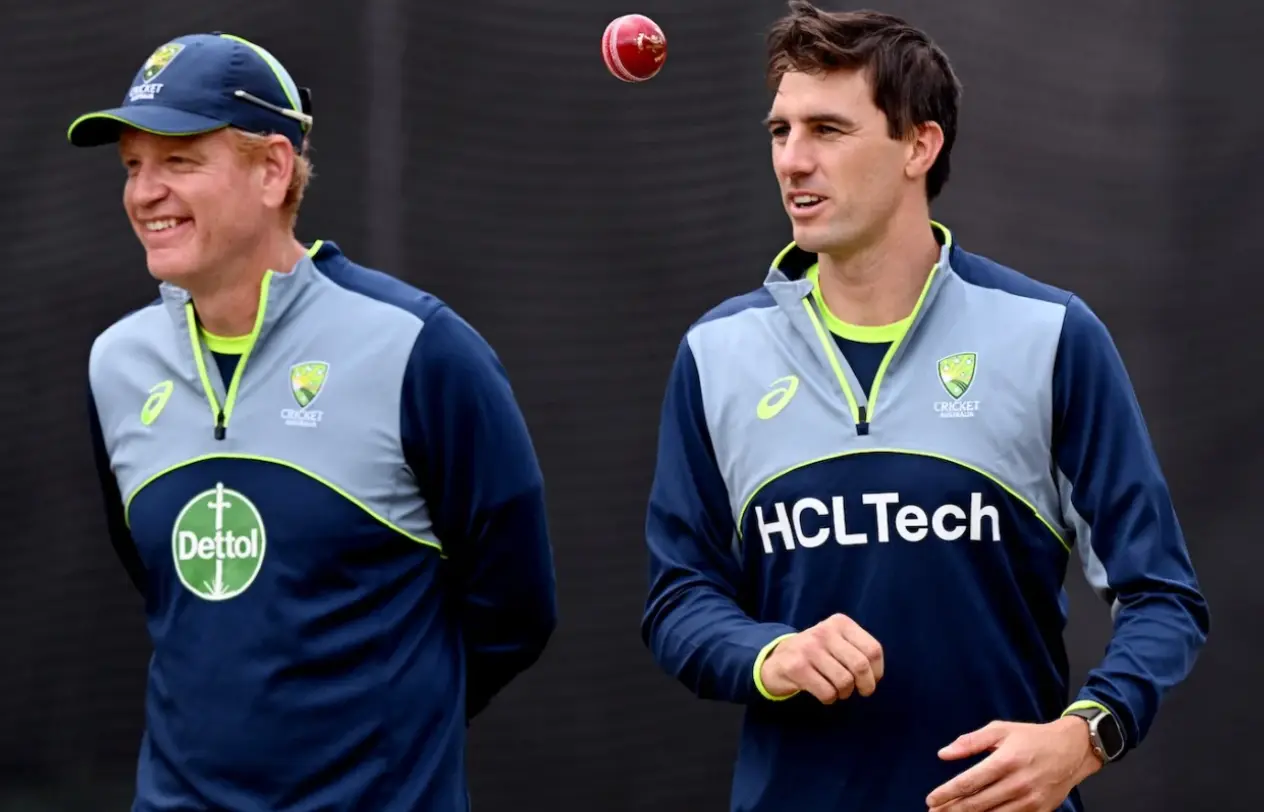 Andrew McDonald with Pat Cummins.