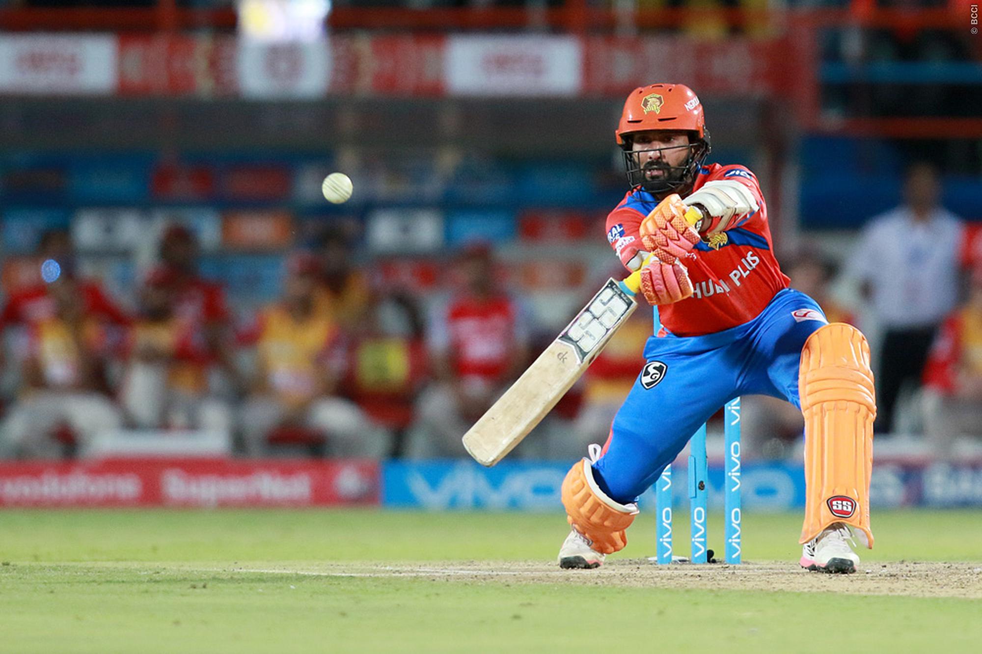 Twitter reacts to Dinesh Karthik's "slow innings" and Dwayne Smith's "exceptional over"