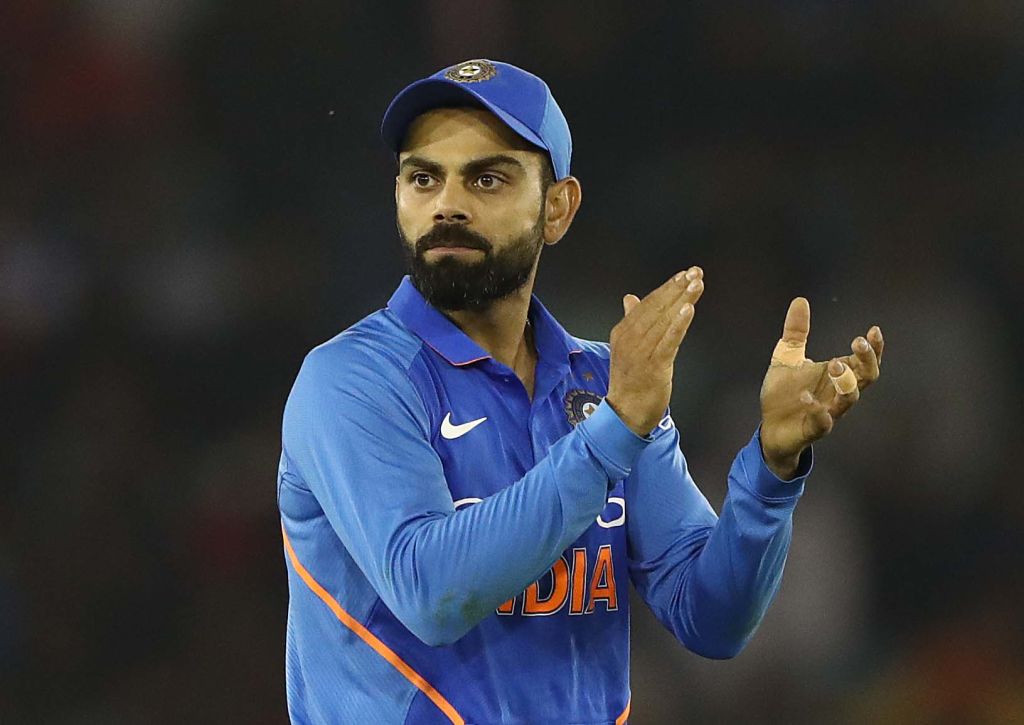 Virat kohli best sale in orange jersey