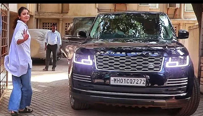 Anushka Sharma with her luxurious Range Rover Car.