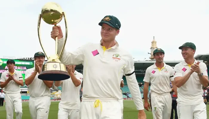 Australian team celebrating with the Border-Gavaskar Trophy.