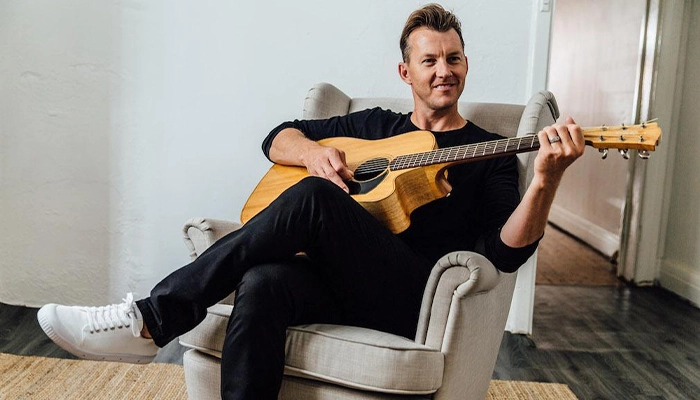 Brett Lee showcasing his guitaring skills and his love for music.