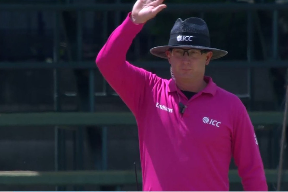 The umpire signalling five penalty runs for Afghanistan during their semifinal game against India