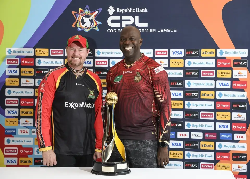 Guyana Amazon Warriors head coach Lance Klusener and Trinbago Knight Riders assistant coach Ottis Gibson with the CPL trophy ahead of the final