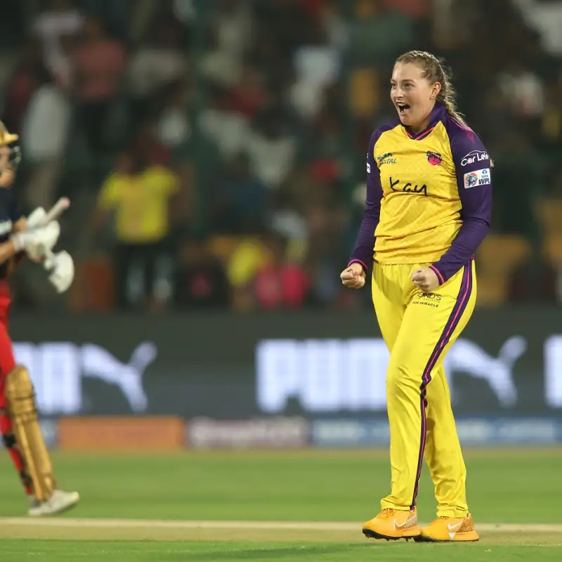 Ecclestone celebrating after taking a wicket against RCB Women.