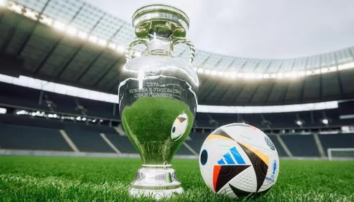 EURO 2024 Trophy along with a Football.