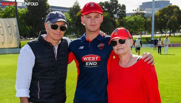 Jake Fraser-McGurk with his parents in a post-match interview.