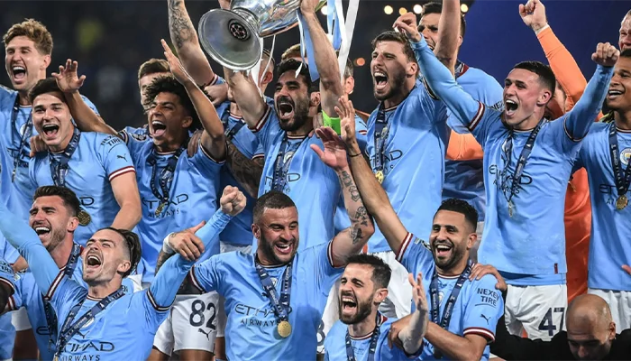 Manchester City with the UEFA Champions League Trophy.