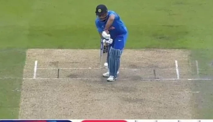 MS Dhoni playing a dot ball when 25 runs were required of just 11 balls.