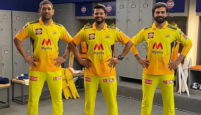 MS Dhoni, Suresh Raina, and Ravindra Jadeja in CSK jersey.