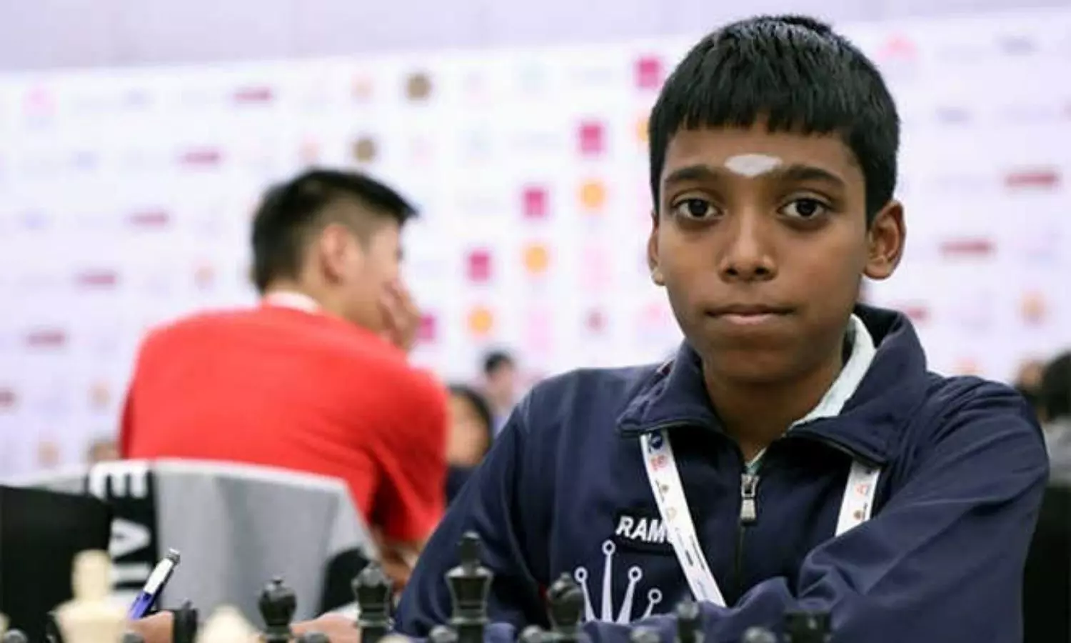 World Cup Final | Praggnanandhaa plays out draw against Carlsen in second classical game