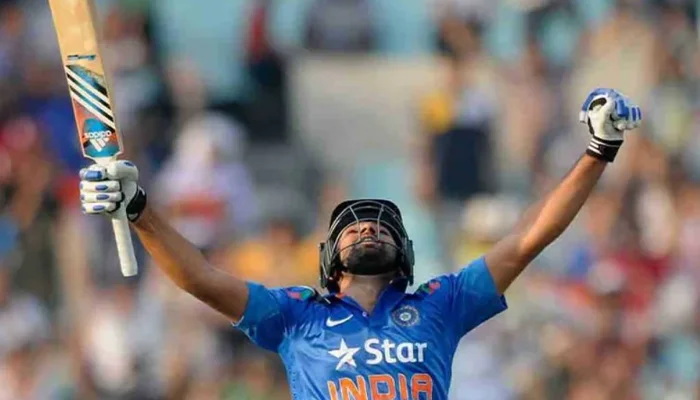 Rohit Sharma celebrates after reaching the 200 runs mark.