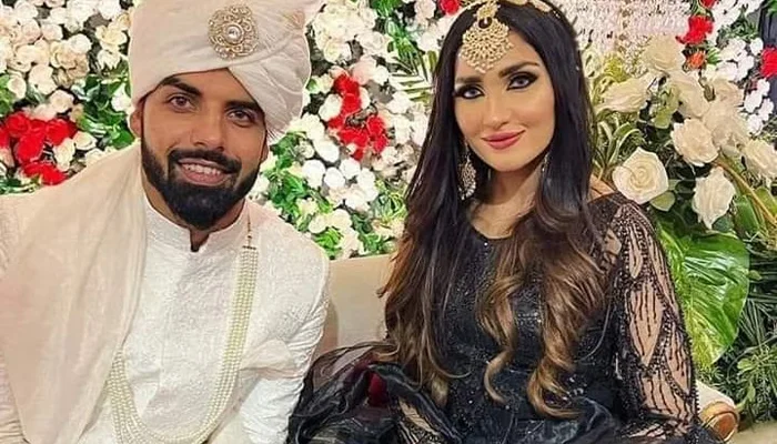 Shadab Khan at his wedding ceremony with his newly married wife Malaika Saqlain.