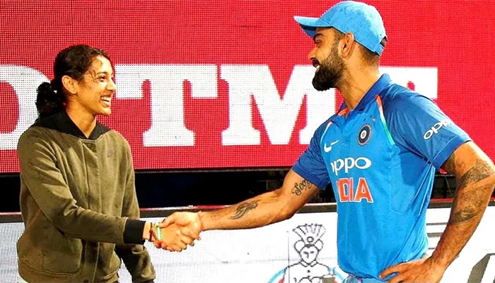 Smriti Mandhana and Virat Kohli talking post-match.