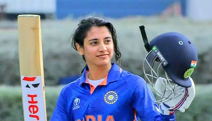 Smriti Mandhana celebrating her debut century.