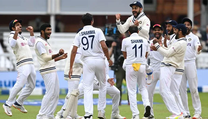 The Indian team celebrates after picking the wickets of Ollie Robinson in the match.