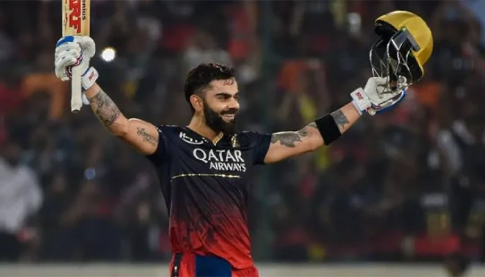 Virat Kohli celebrates after hitting a century for the RCB team.