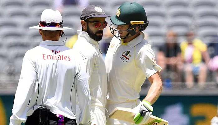 Virat Kohli in a heated exchange against Tim Paine of the Australian team.