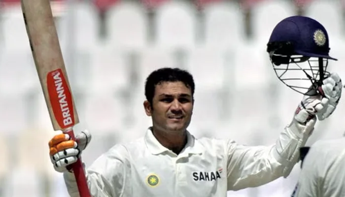 Virender Sehwag celebrating after hitting a triple-century against the Pakistan team.